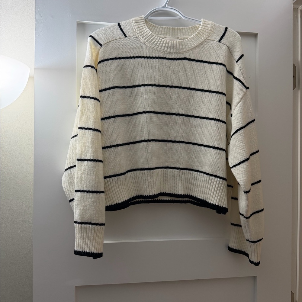 Elegant Black and Cream Striped Women's Sweater